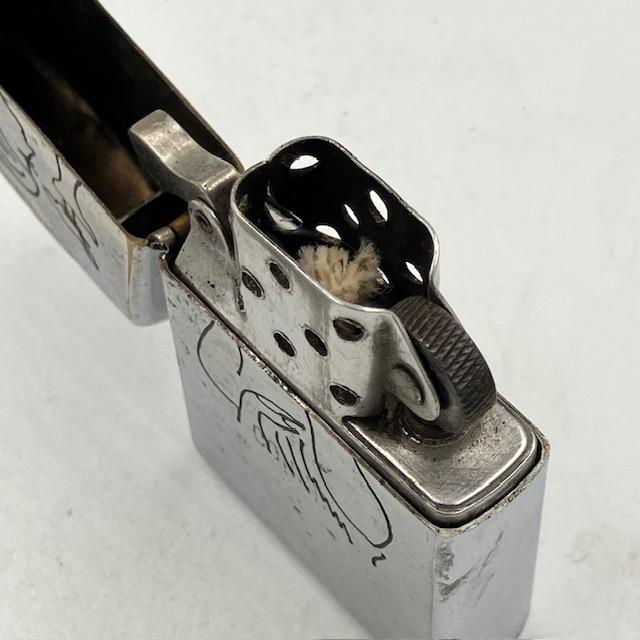 ZIPPO ベトナムジッポー ウーマン　ドッグ ZIPPO（ジッポー） ベトナムジッポー 1968年 人気のだまし絵 使えます