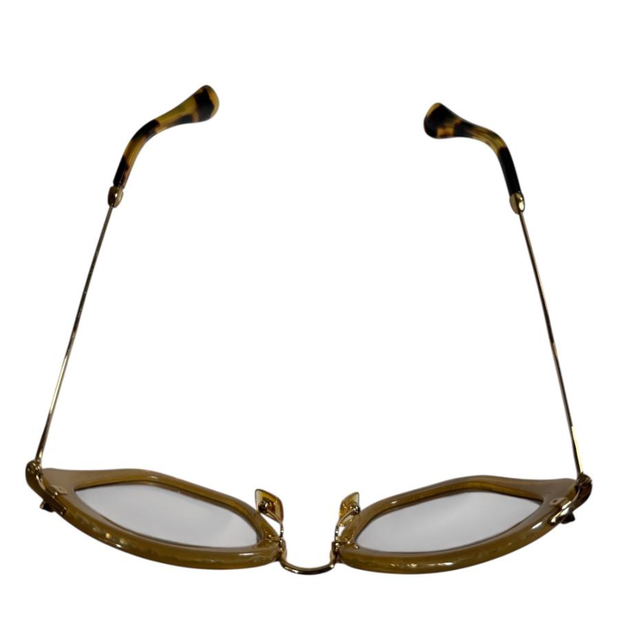 MIUMIUサングラス キャットアイ 黒×ゴールド 中古　美品 miu miu（ミュウミュウ） 美品 キャットアイ ラメ サングラス アイ