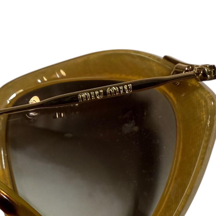 MIUMIUサングラス キャットアイ 黒×ゴールド 中古　美品 miu miu（ミュウミュウ） 美品 キャットアイ ラメ サングラス アイ
