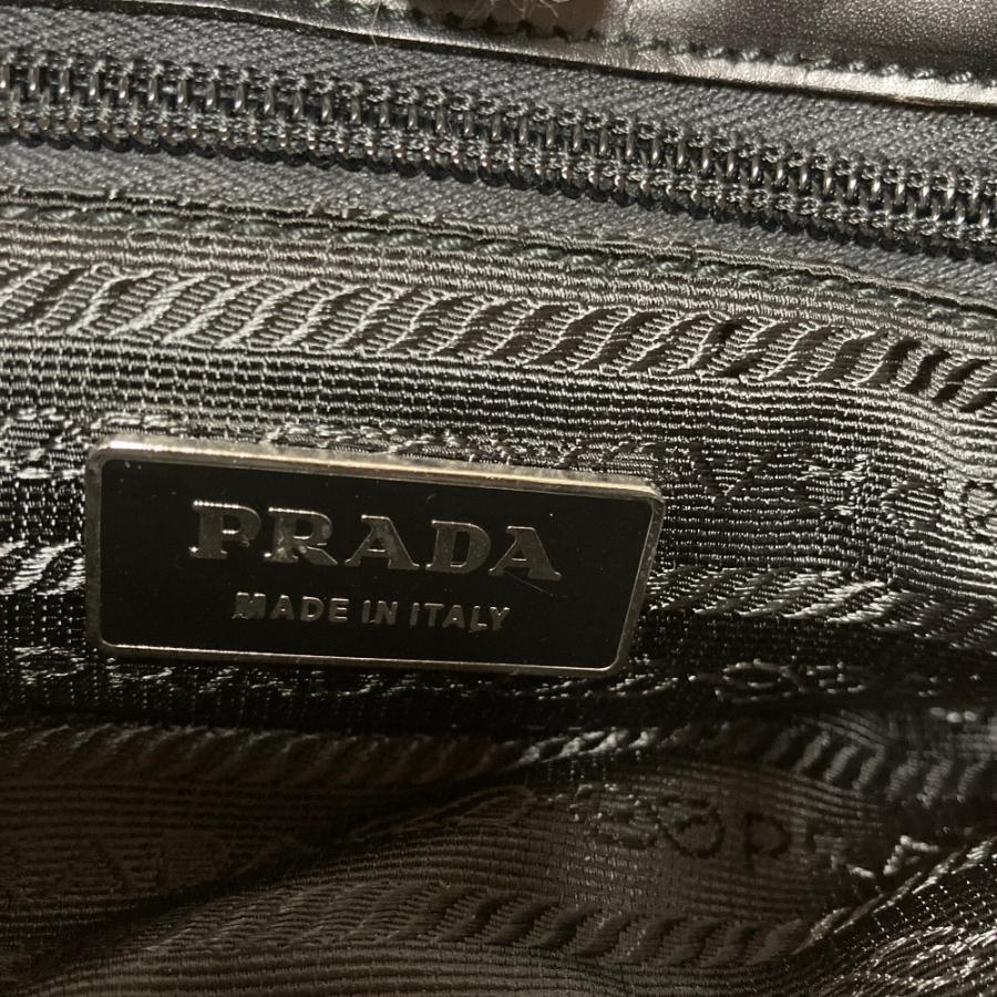PRADA（プラダ） 美品 トライアングルロゴプレート フラワーモチーフ
