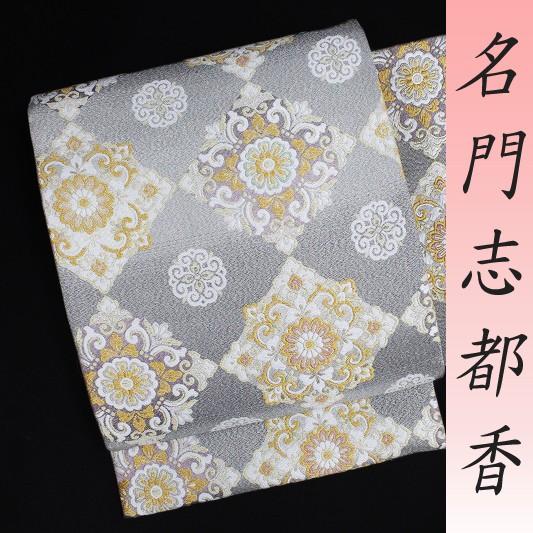 袋帯 正絹 唐織 新品 西陣 志都香 縒金綴れ シルバー グレー 市松 華文