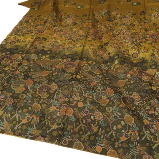 大島紬 着物 中古 正絹 袷 セミフォーマル 波に花模様 暈し 黄唐茶色  