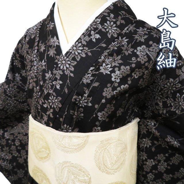 都喜エ門 証紙あり 紅葉が織られた大島紬の小紋 着物 本場