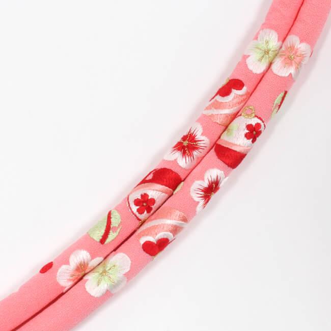 帯締め 丸ぐけ 振袖用 正絹 ピンク地 赤×白 梅鈴 刺繍入り　礼装用  日本製
