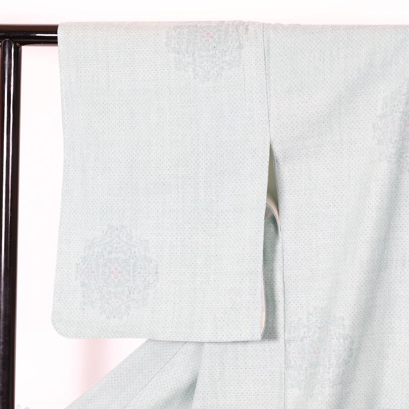 本場結城紬　新品未使用品　水色　藍　茶　花　絣柄　100亀甲　T418の画像