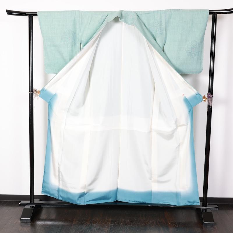 本場結城紬　新品未使用品　水色　藍　茶　花　絣柄　100亀甲　T418の画像