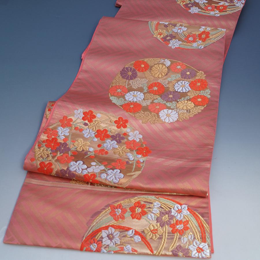 袋帯 西陣 加納本家 振袖向き 桧垣に花丸紋 六通柄 紅梅色 フォーマル  