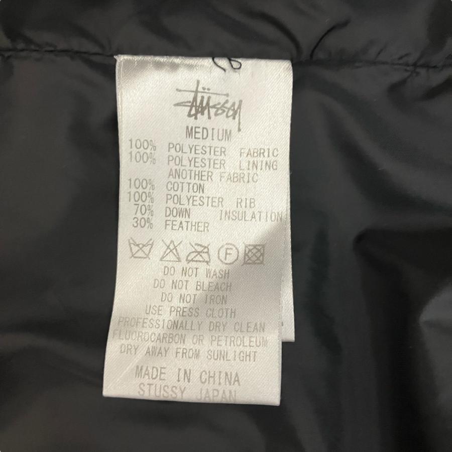 STUSSY（ステューシー） 総柄 ダウンジャケット ブラック サイズ：M