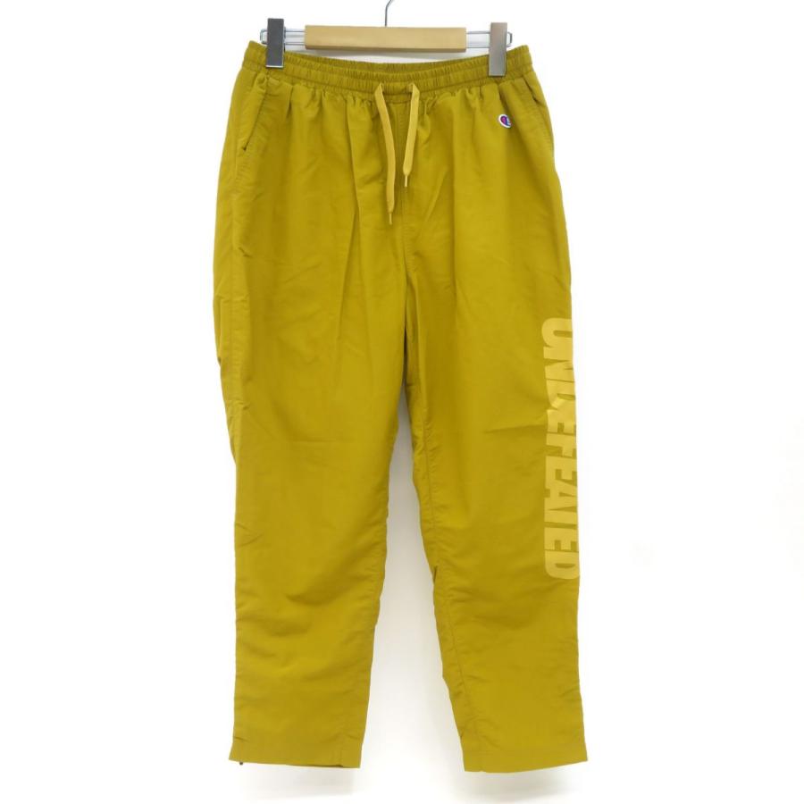 CHAMPION チャンピオン × UNDEFEATED アンディフィーテッド ロゴ 