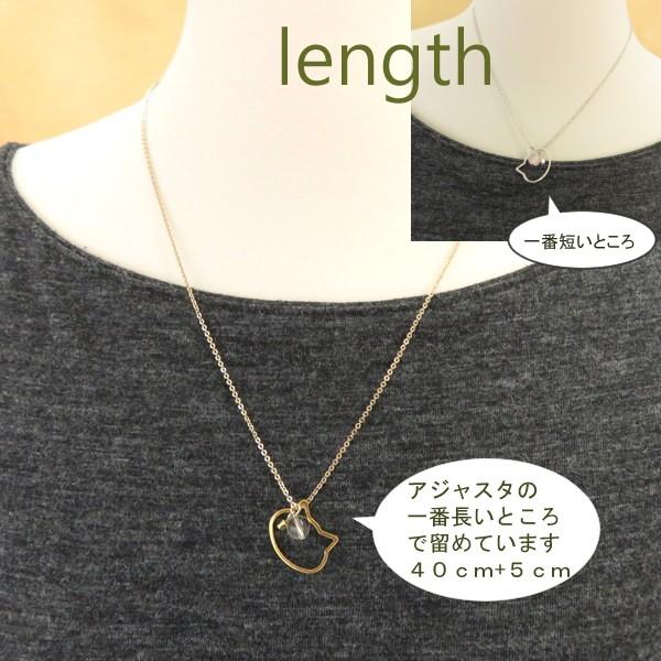 琥珀のネックレスに猫が描いている可愛いネックレス留め金はシルバー