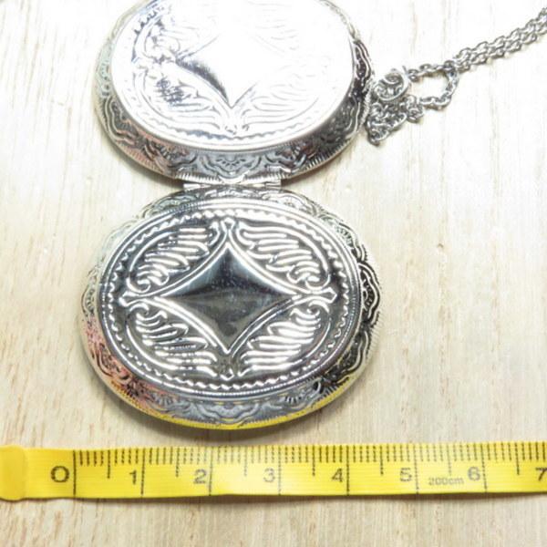 ロケットペンダント 大ぶり 大きめ アンティーク柄 リバーシブル だ円