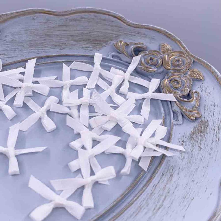 ネイルパーツ リボン デコパーツ ネイルパーツ リボン ホワイト 7mm 艶消し 50個 ミニ 3D 蝶々