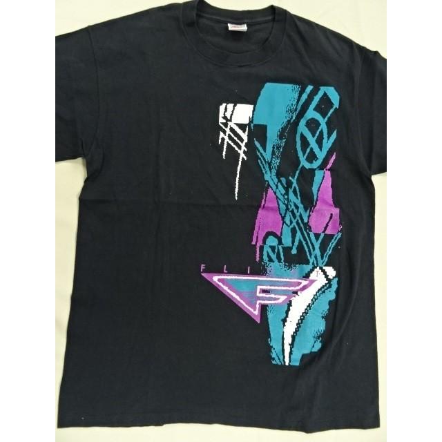 turquoise and purple nike shirt