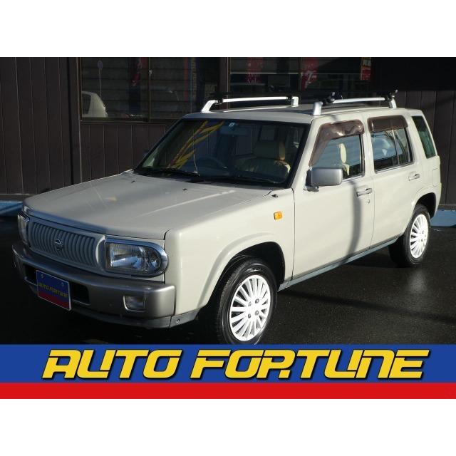 在庫あり 支払総額7 000円 中古車 背面タイヤ 革調シートカバー 4wd ラシーン 日産 中古車