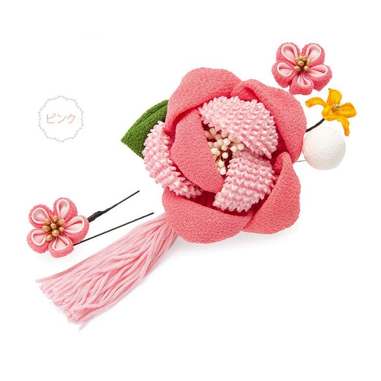 こーちゃページです 小さい和柄のリボン赤いちりめんのお花と下がりつき 飾り紐付き 和柄リボンコーム 赤×黒絞り | Chigusa