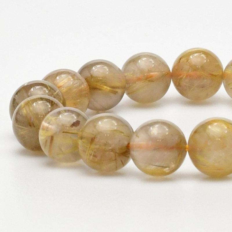 スモーキーゴールドが魅力12mm ゴールドルチル【金運の王様ブレス一点