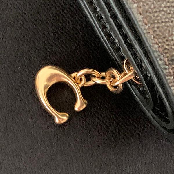 COACH（コーチ） 二つ折り財布 シグネチャー スヌーピー ウッド