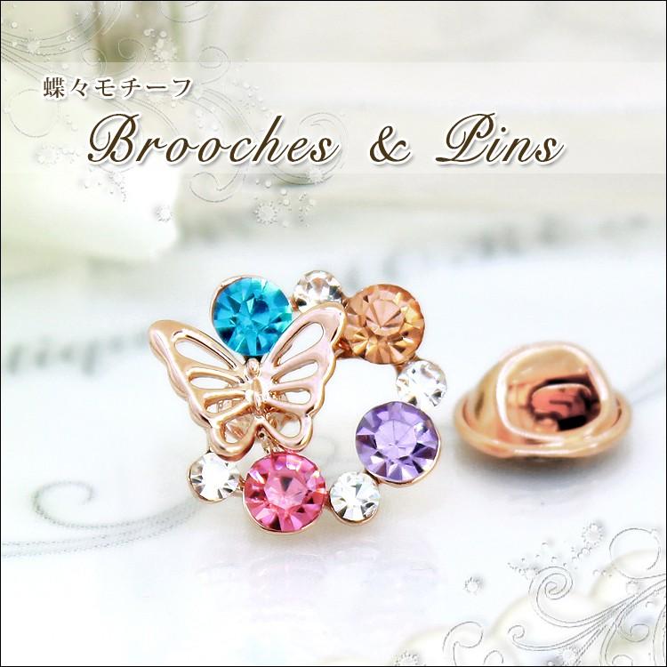 【SWAROVSKI】ピンバッジ タックピン スワールデザイン 結び目 美品 SWAROVSKI】ピンバッジ タックピン スワールデザイン 結び目 美品