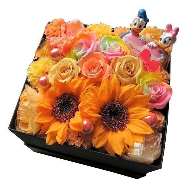 プリザーブドフラワー あすつく 結婚祝い 結婚記念日 ひまわり入り ドナルド デージー ハート 花束風 フラワーギフト レインボーローズ