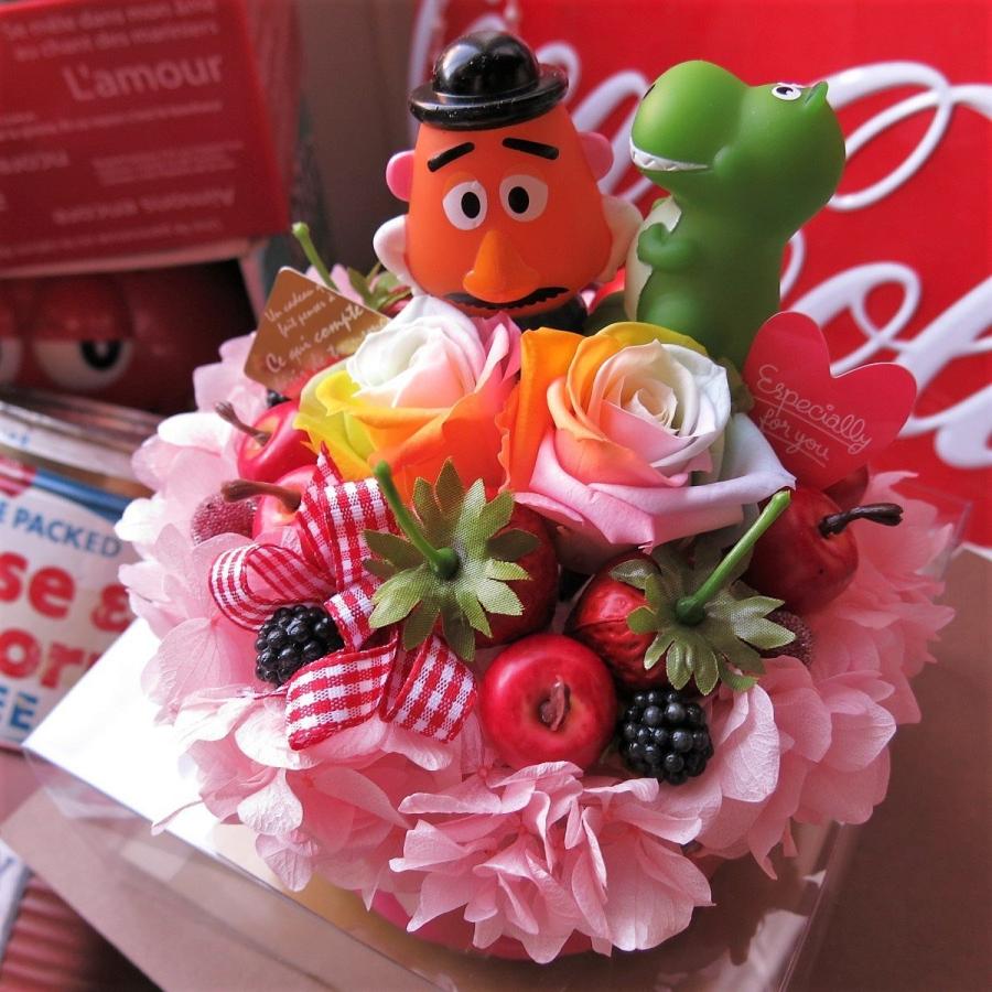 お誕生日 トイストーリー マスコット入り 花 レインボーローズ プリザーブドフラワー入り フラワーケーキ ケース入り キャラクターいずれかおまかせ2個入り Pre Raincake Toymascot2 002 フラワーガーデンリーブス 通販 Yahoo ショッピング