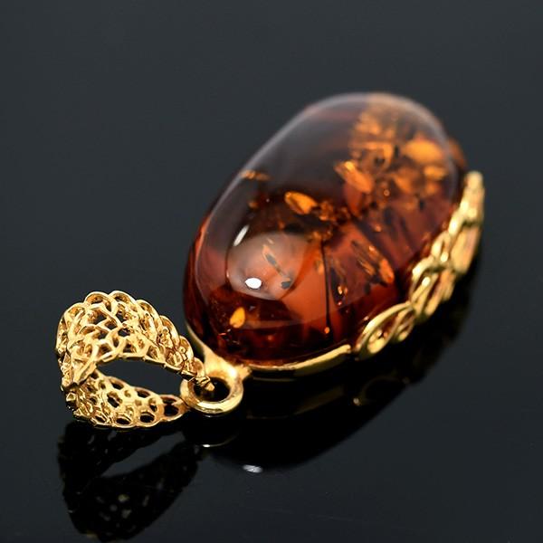 大粒琥珀ペンダントトップ きらきらグリッターきらめく とろりとした