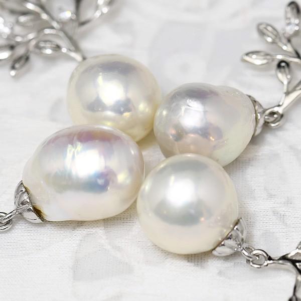 バロックパールとルビーのシルバー手作りペンダント。 バロックパールとルビーのシルバー手作りペンダント。