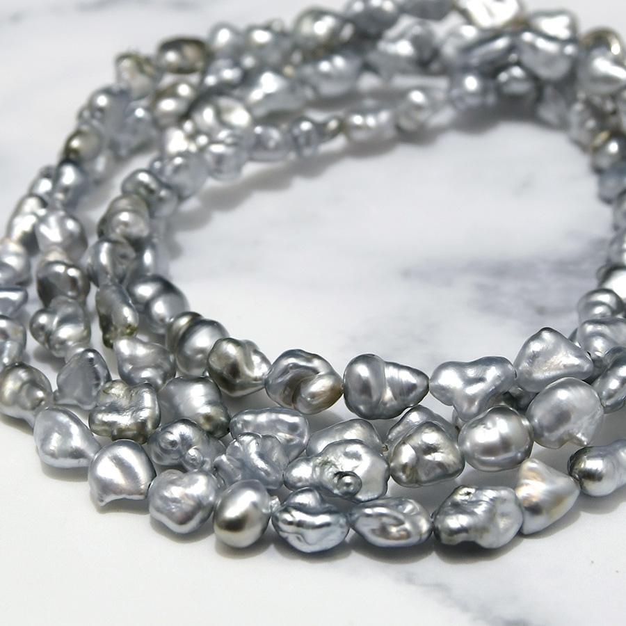 no.0185  ブラックルチルと，あこやケシ真珠 黒蝶 ケシ 真珠 ロングネックレス 気品に満ちたシックな輝き