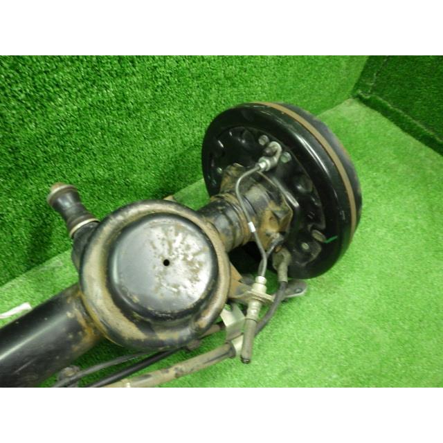 ジャスティ DBA-M910F RアクスルホーシングASSY アーム付/ドラム付 