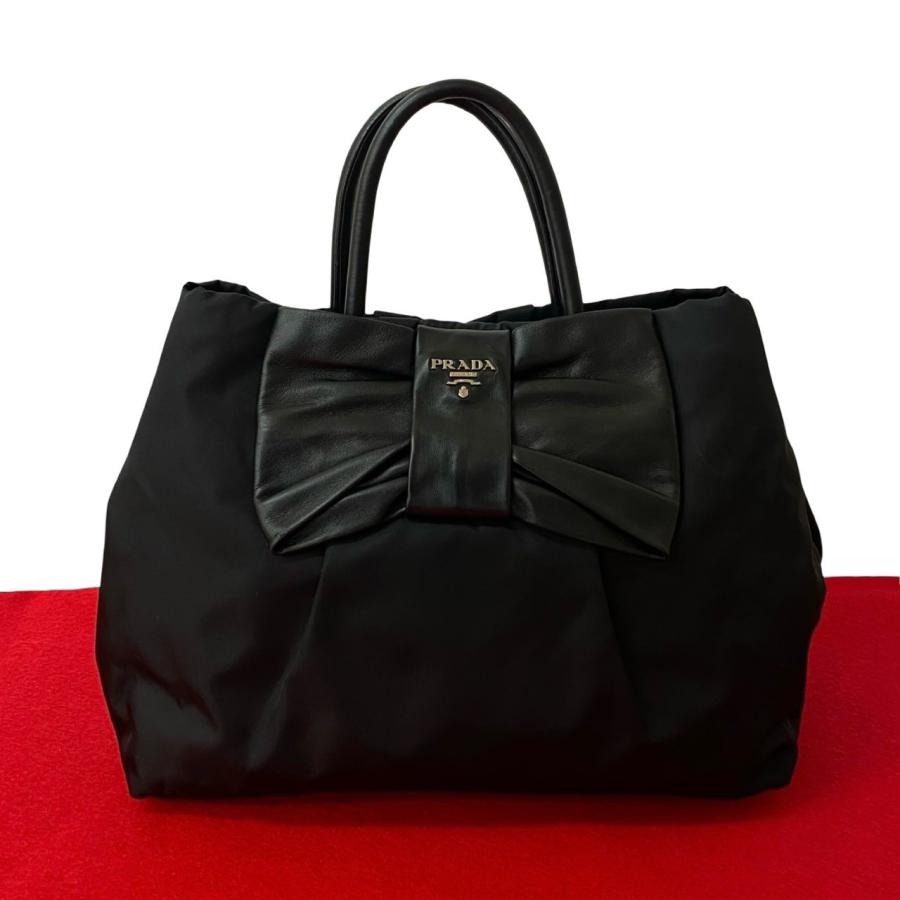 PRADA 極 美品 袋付き プラダ ロゴ 金具 リボン モチーフ ナイロン 