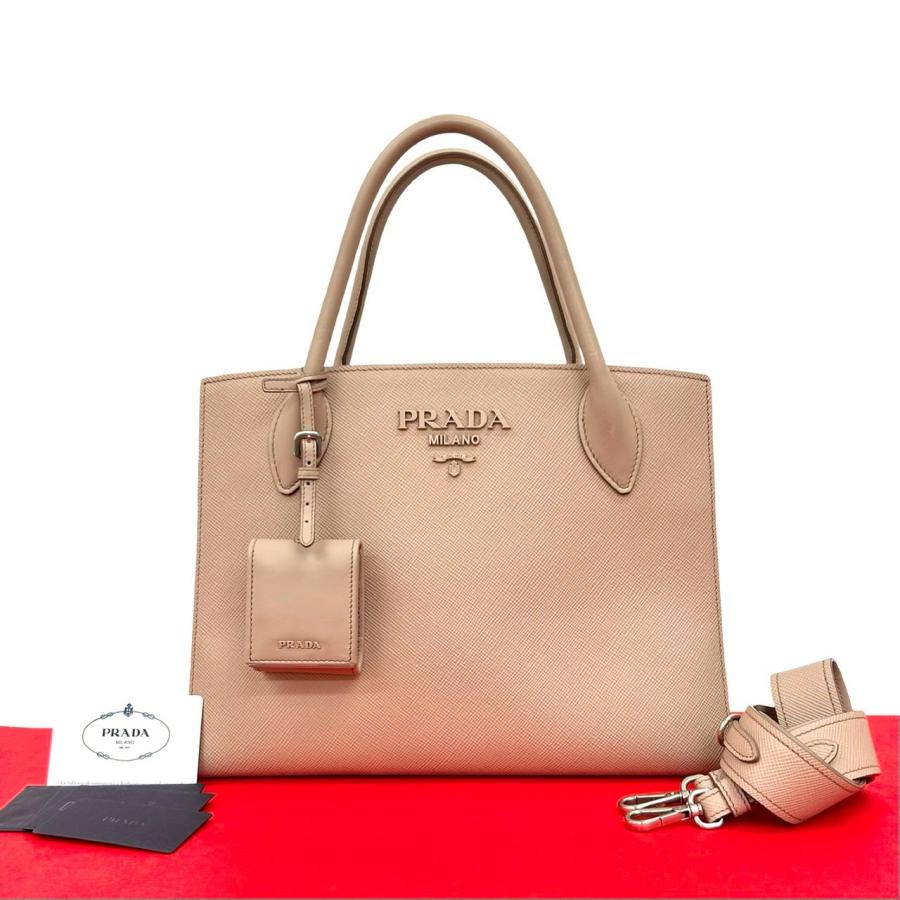 PRADA（プラダ） 極 美品 モノクローム ロゴ 金具 サフィアーノ レザー