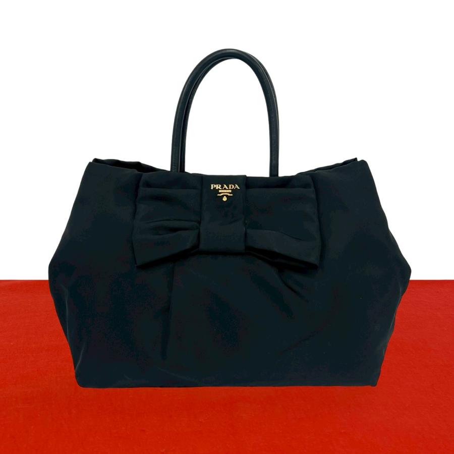 PRADA（プラダ） 極 美品 ロゴ 金具 リボン モチーフ ナイロン レザー