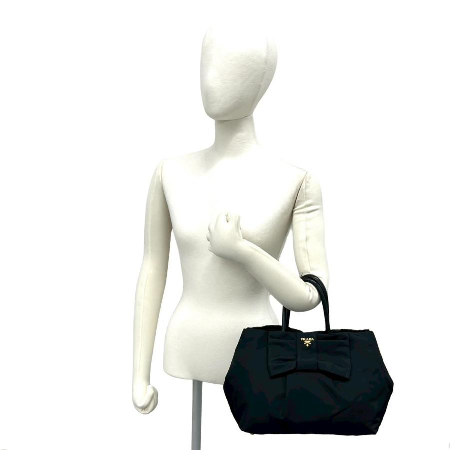 PRADA（プラダ） 極 美品 ロゴ 金具 リボン モチーフ ナイロン レザー