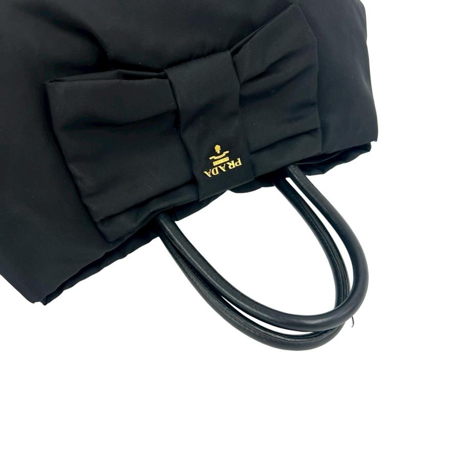 PRADA（プラダ） 極 美品 ロゴ 金具 リボン モチーフ ナイロン レザー