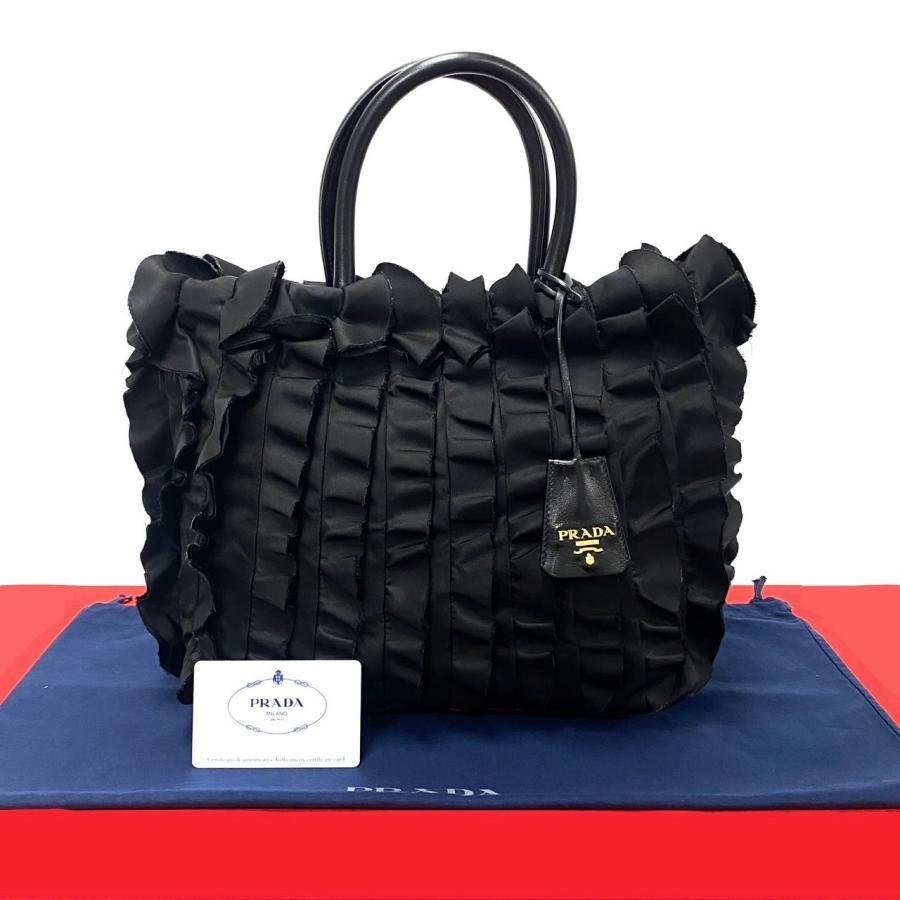 PRADA ほぼ未使用 希少品 カード付 プラダ フリル ロゴ 金具 PRADA ほぼ未使用 希少品 カード付 プラダ フリル ロゴ 金具
