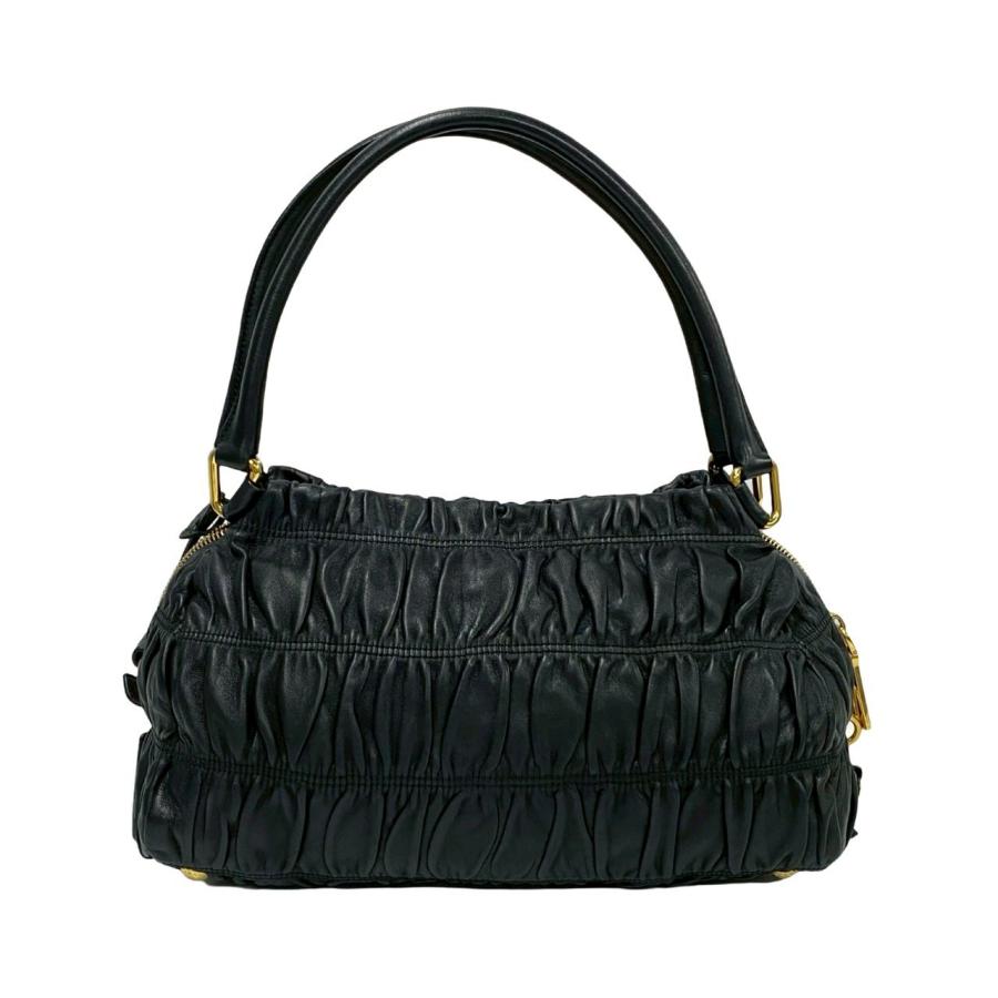 PRADA（プラダ） 極 美品 袋 鍵付き ロゴ 金具 リボン モチーフ レザー
