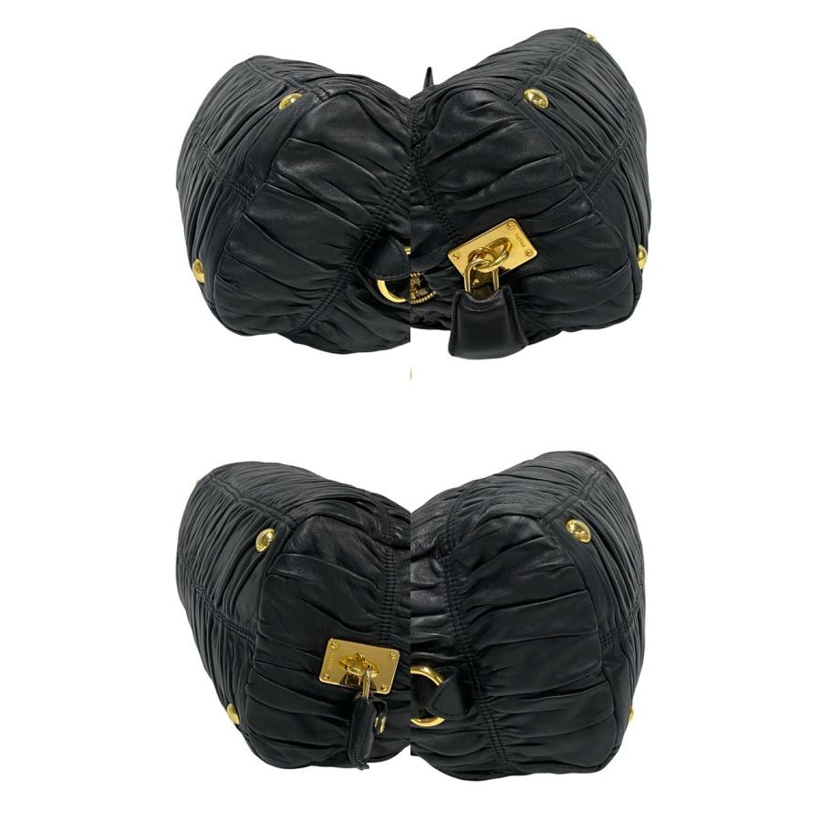 PRADA（プラダ） 極 美品 袋 鍵付き ロゴ 金具 リボン モチーフ レザー