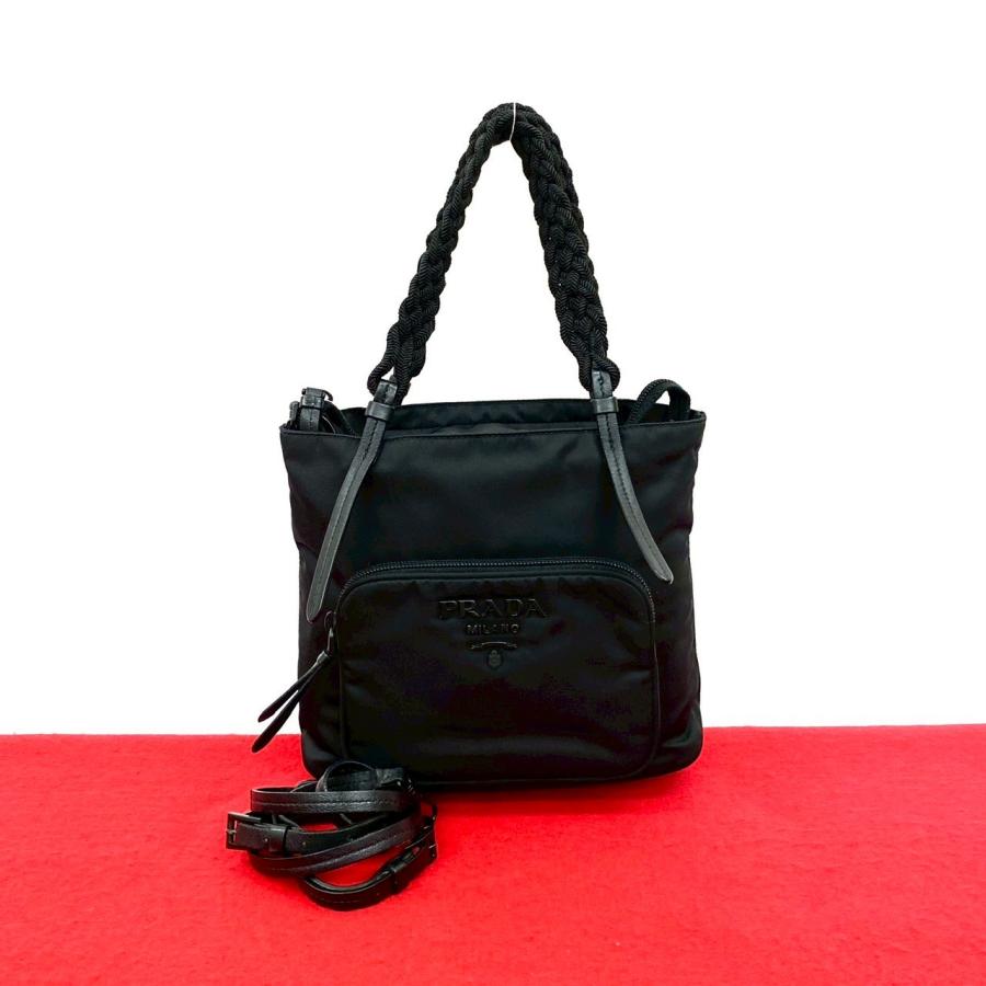 PRADA（プラダ） 極 美品 ロゴ 金具 テスート ナイロン レザー 本革