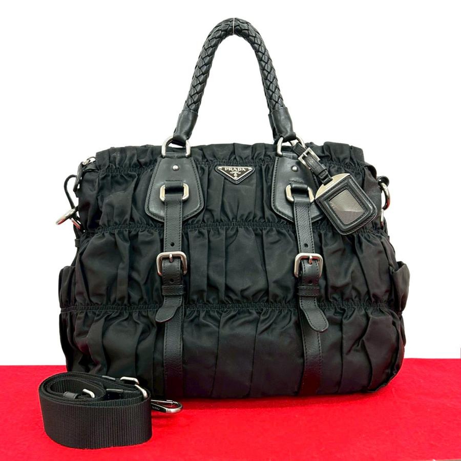 PRADA（プラダ） 極 美品 三角ロゴ プレート 金具 ギャザー