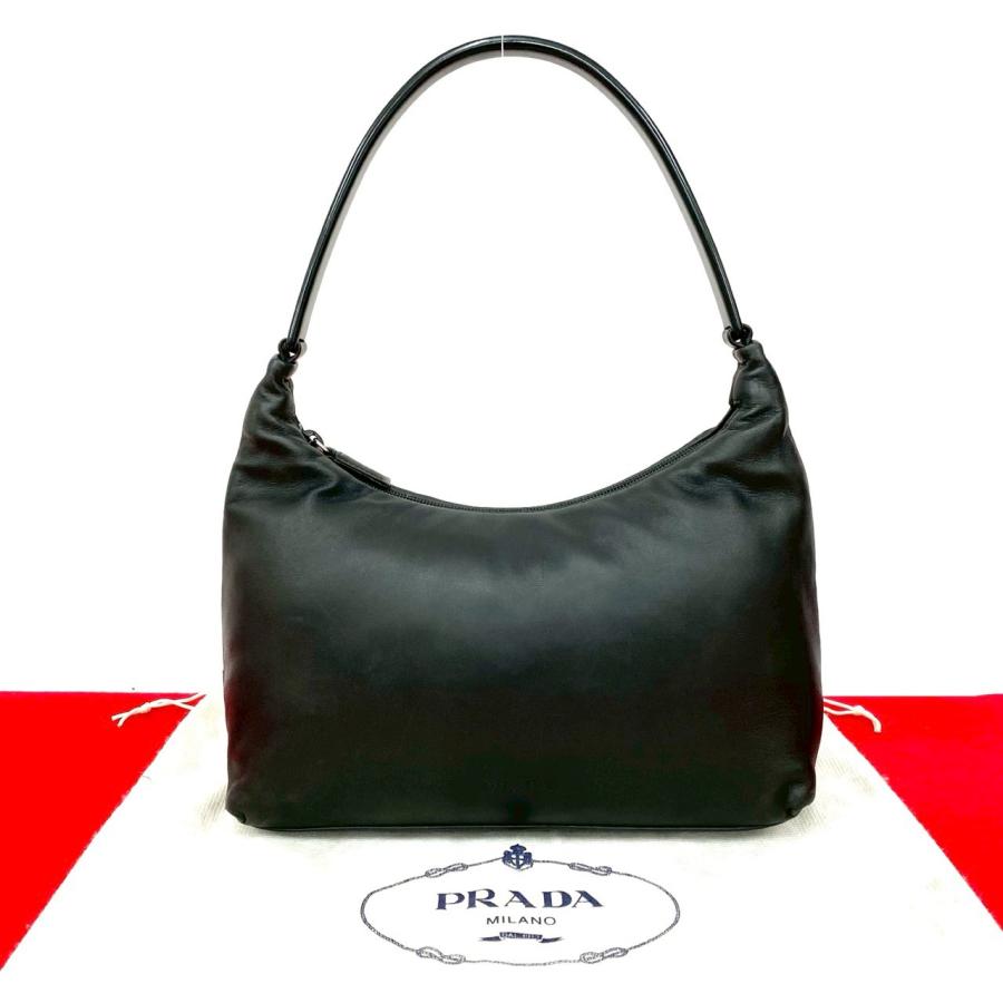 PRADA（プラダ） 極 美品 希少品 保存袋付 ロゴ 刻印 レザー 本革 セミ