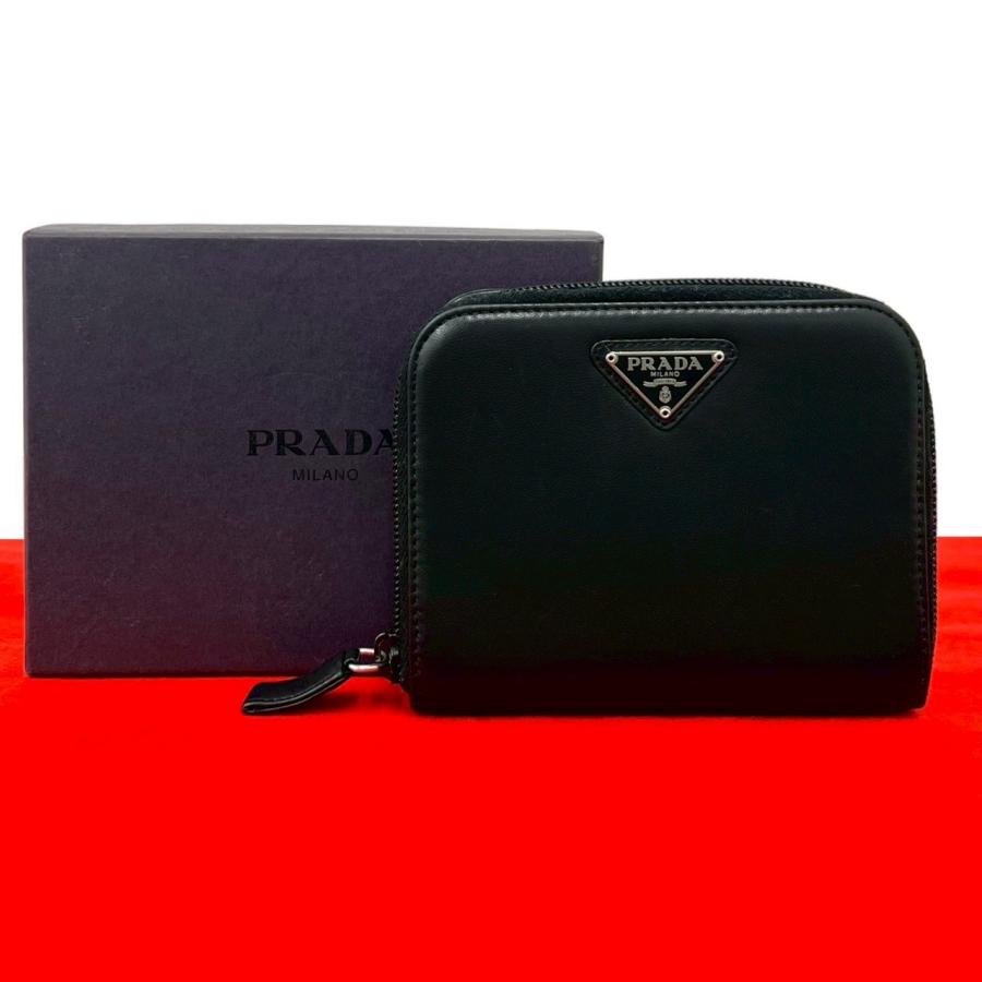 PRADA（プラダ） 極 美品 箱付 三角ロゴ 金具 レザー 本革 二つ折り 