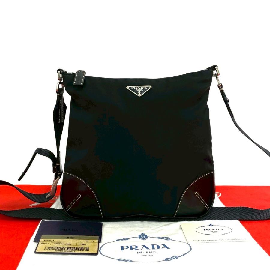 PRADA（プラダ） 極 美品 保存袋付 三角ロゴ 金具 ナイロン レザー 本