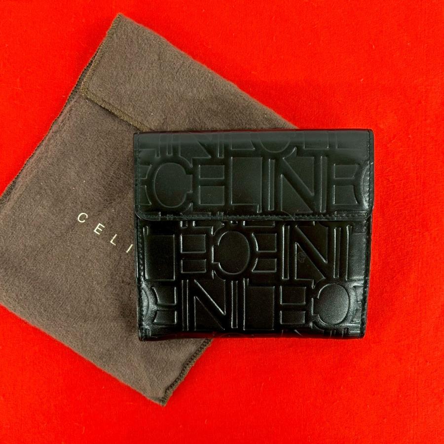 美品✨ CELINE ロゴ レザー コンパクトウォレット ミニ 折り財布 CELINE（セリーヌ） 未使用保管品 保存袋付き ロゴ エンボス レザー 本