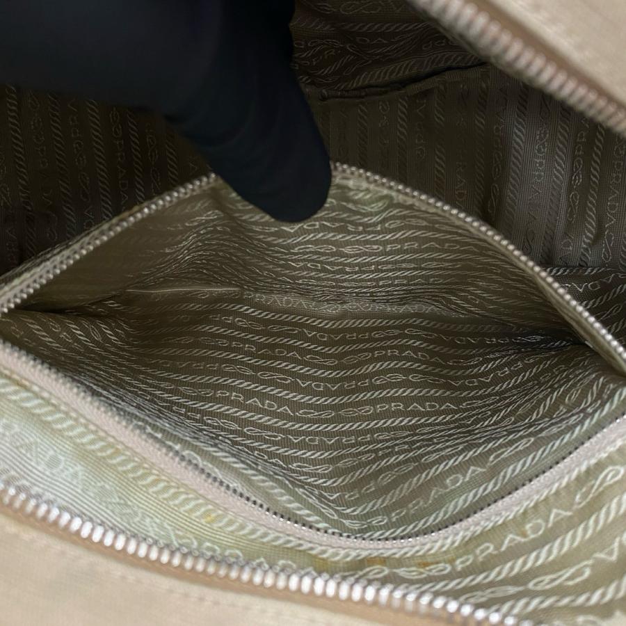 PRADA（プラダ） 極 美品 三角ロゴ 金具 キャンバス レザー 本革