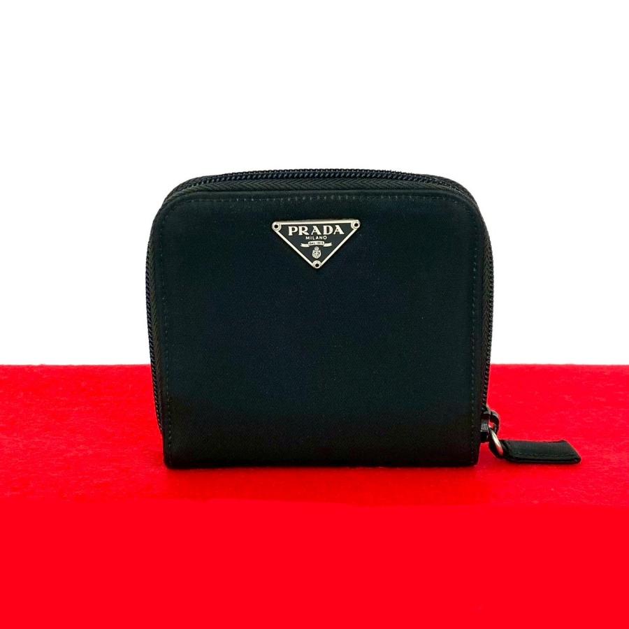 美品 プラダ　二つ折り財布　サフィアーノ　三角ロゴ　ラウンドファスナー　黒 美品 プラダ 二つ折り財布 三角ロゴ サフィアーノレザー