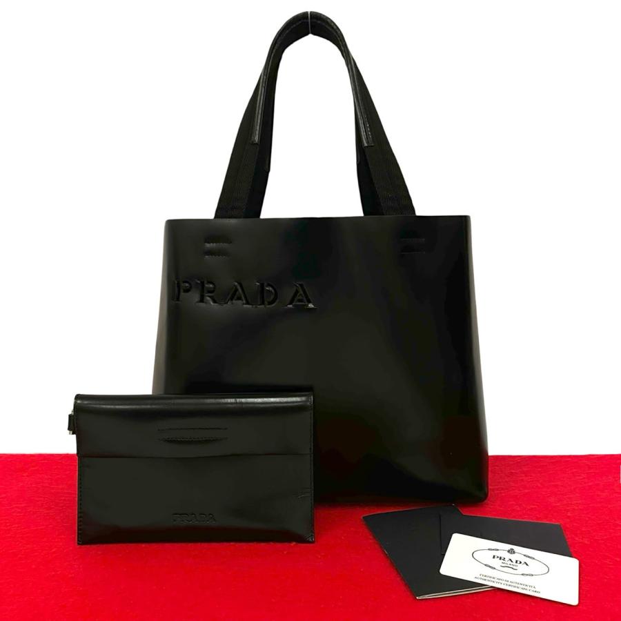 PRADA（プラダ） 極 美品 希少品 カード付 ロゴ 型抜き レザー 本革