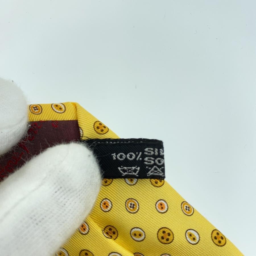 Salvatore Ferragamo サルヴァトーレフェラガモ ボタン柄 総柄 イエロー シルク 剣先 9cm ネクタイ メンズ 303932 |  | 06