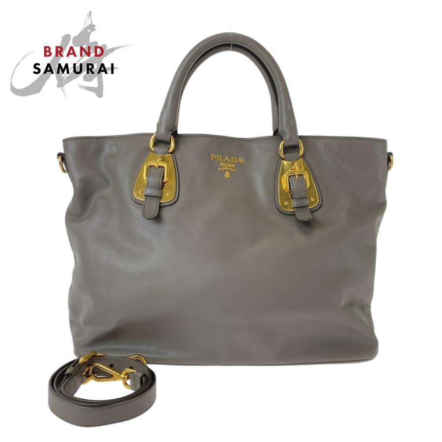 PRADA ハンドバッグ グレージュ レザー ゴールド金具 PRADA（プラダ） グレー グレージュ ゴールド金具 レザー トートバッグ