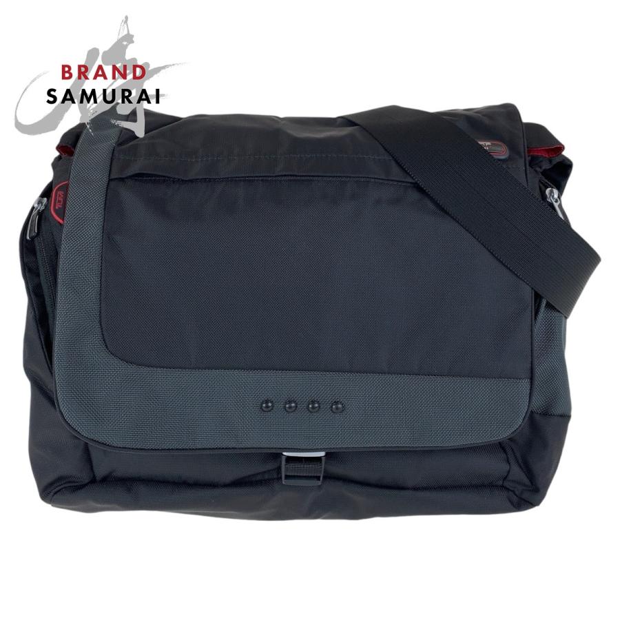 TUMI（トゥミ） 美品 T-TECH ブラック レッド シルバー金具 キャンバス 