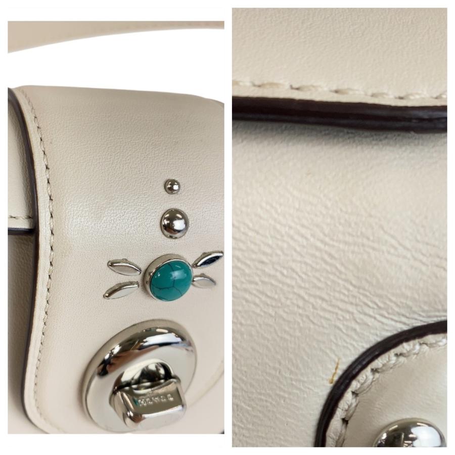 COACH（コーチ） スタッズ パイソン型押し ホワイト ブラウン シルバー 