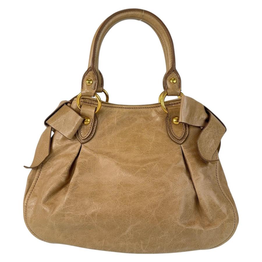 miu miu（ミュウミュウ） 美品 リボン ベージュ ゴールド金具 レザー